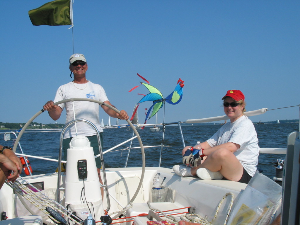 A big Larry smile at the wheel of Chantecler - J/105 sailboat for sale by owner