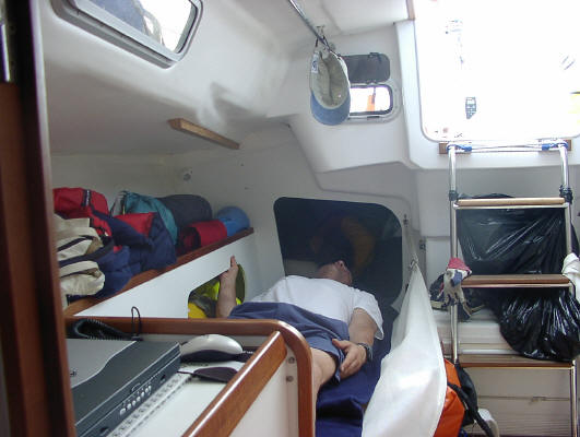 J105 port side of the cabin when racing offshore, navigation computer, lee clothes, quarter berth, companionway, ice chest